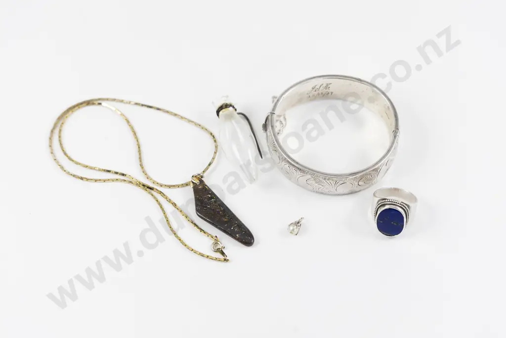 S/S Half Engraved Hinged Snap Bangle with Assorted Image 1++