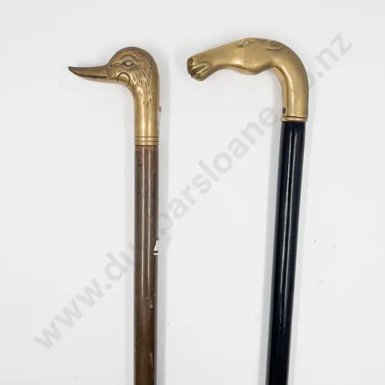 Two Brass Animal Handled Walking Sticks