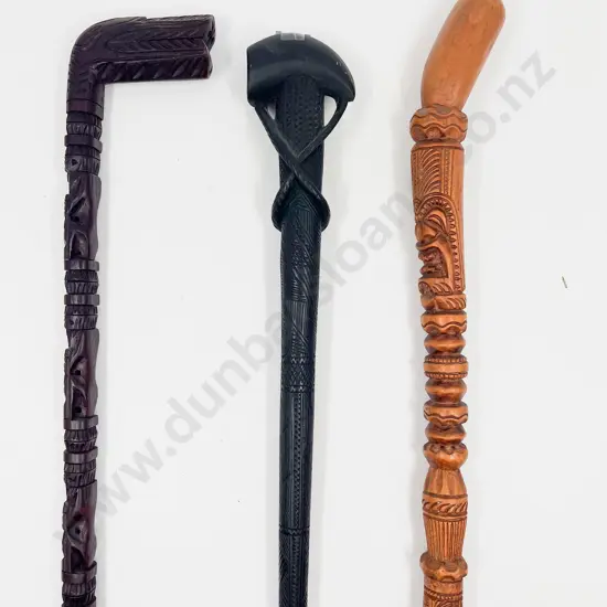 Three Various Carved Walking Sticks