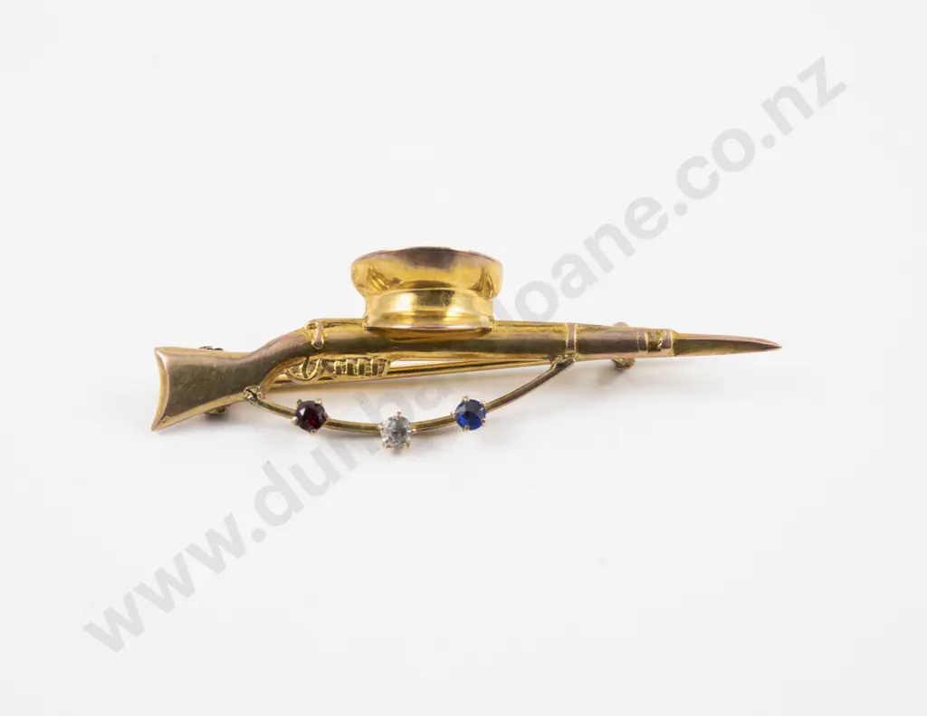 WWI Period 9ct Sweetheart Brooch of Rifle and Cap with Three Crystals Red White & Blue Image 1++
