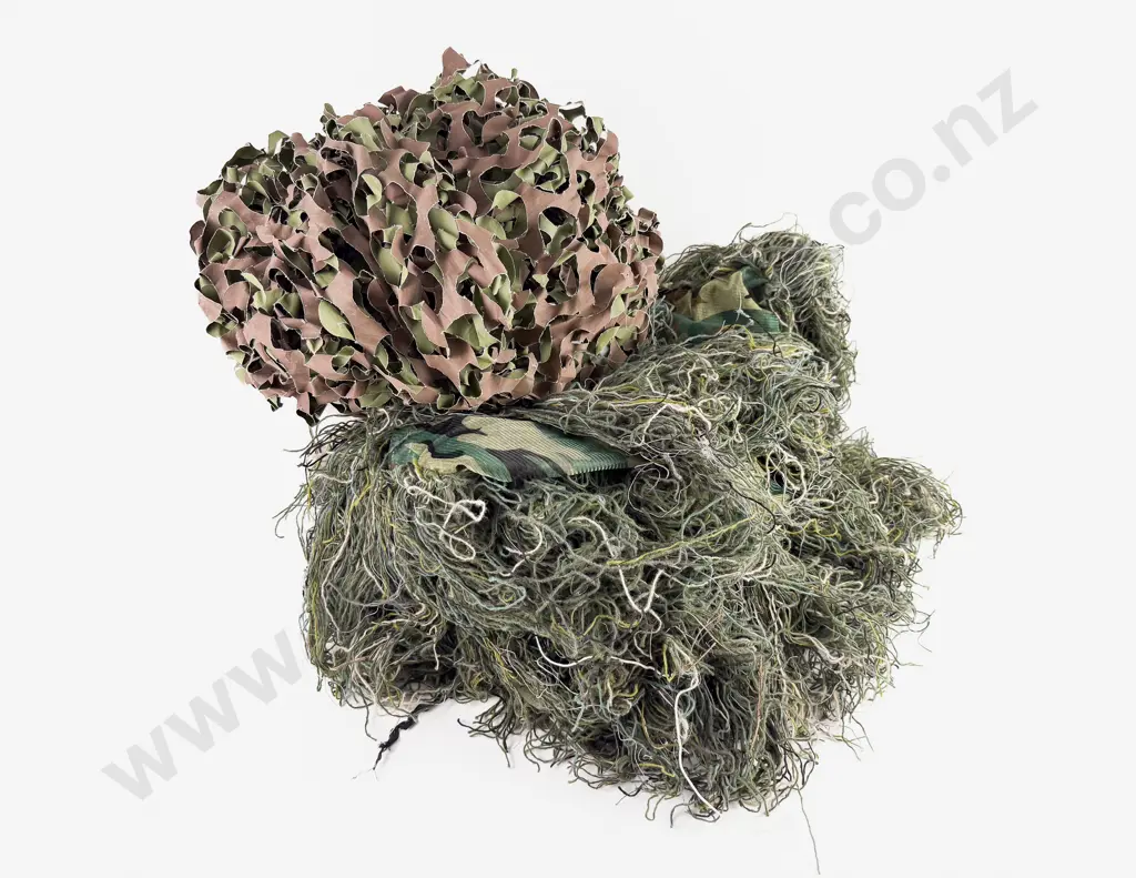 Pair Ghillie Camouflage Pants and Piece of Camouflage Netting Image 1++