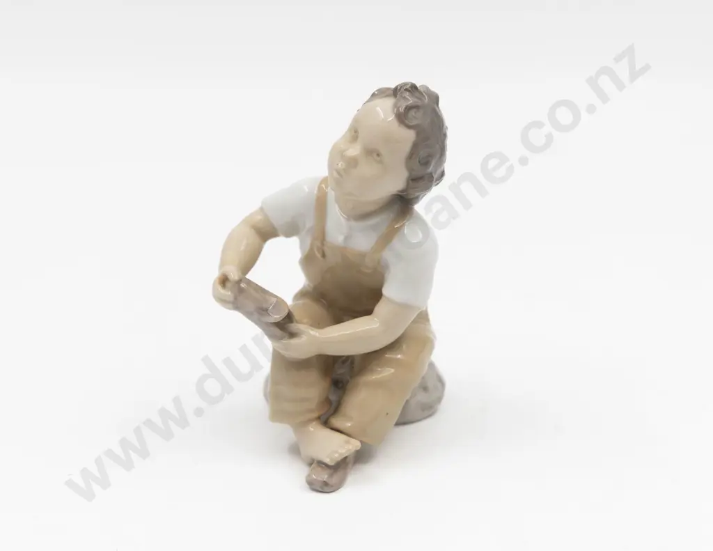B&G Seated Boy Figure Image 1++
