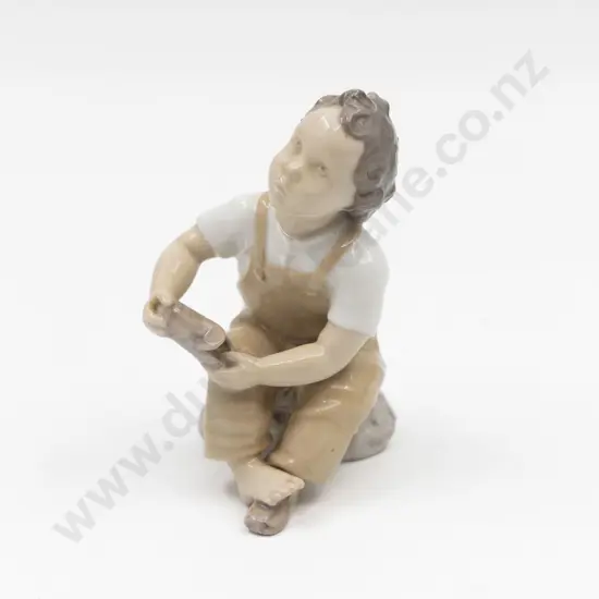 B&G Seated Boy Figure