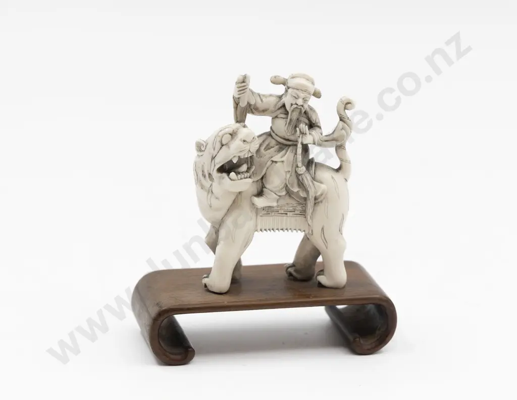 Chinese Carved Ivory Immortal Riding on the Back of a Tiger on Stand Image 1++