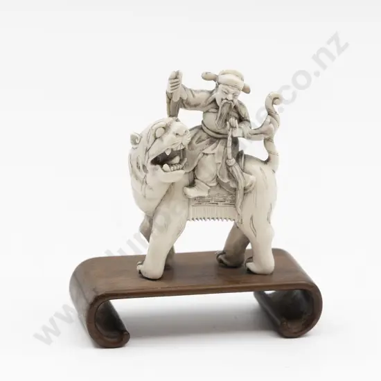 Chinese Carved Ivory Immortal Riding on the Back of a Tiger on Stand