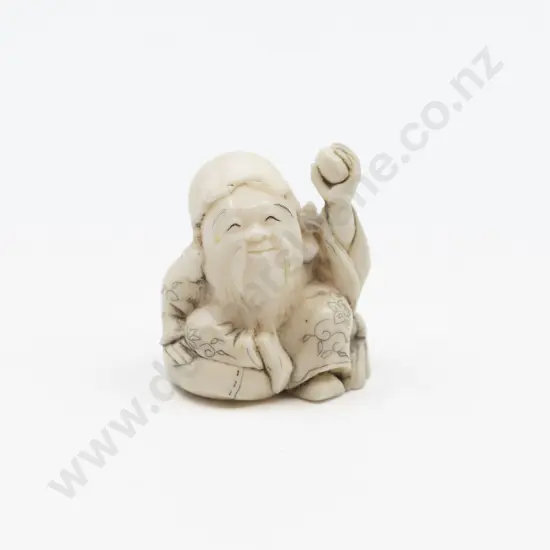 Signed Carved Ivory Netsuke of Seated Immortal