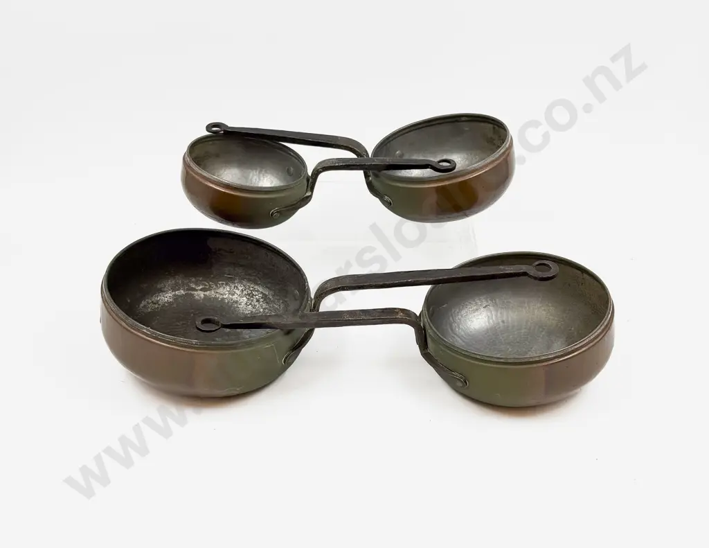 Graduated Set of Four Copper Saucepans Image 1++
