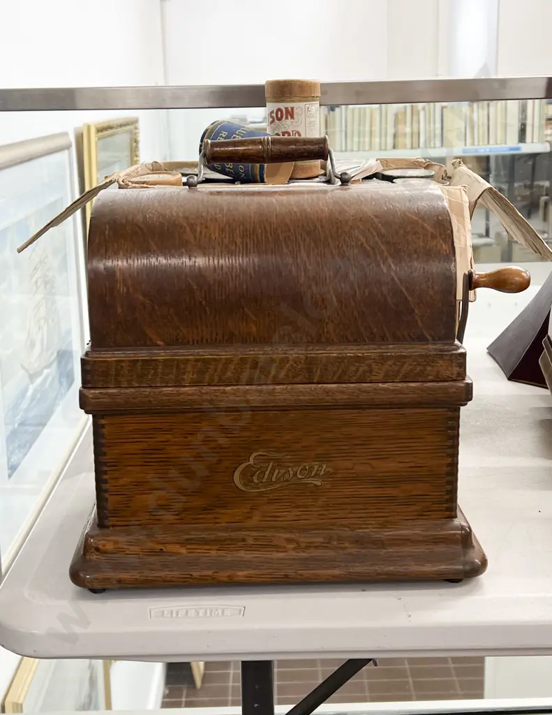 Oak Cased Edison Fireside Phonograph with Box of Assorted Edison Rolls Image 1++