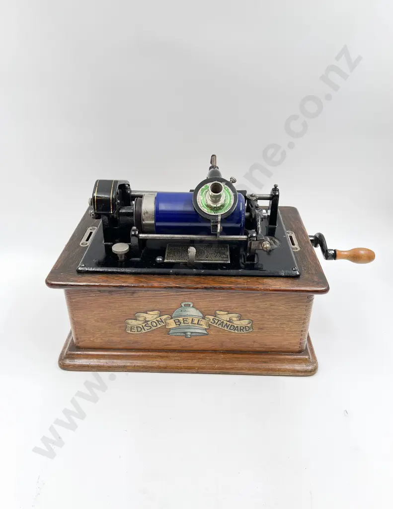 Oak Cased Edison Bell Standard Phonograph with Box of Assorted Edison Rolls Image 1++