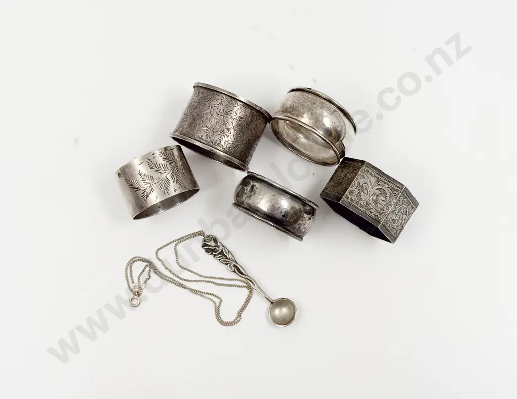 Five S/S Napkin Rings together with Small S/S Mustard Spoon Image 1++