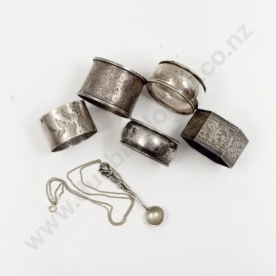 Five S/S Napkin Rings together with Small S/S Mustard Spoon