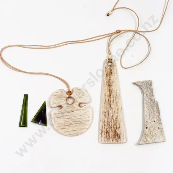 Two Bone Pendants together with Two Small Greenstone Pieces