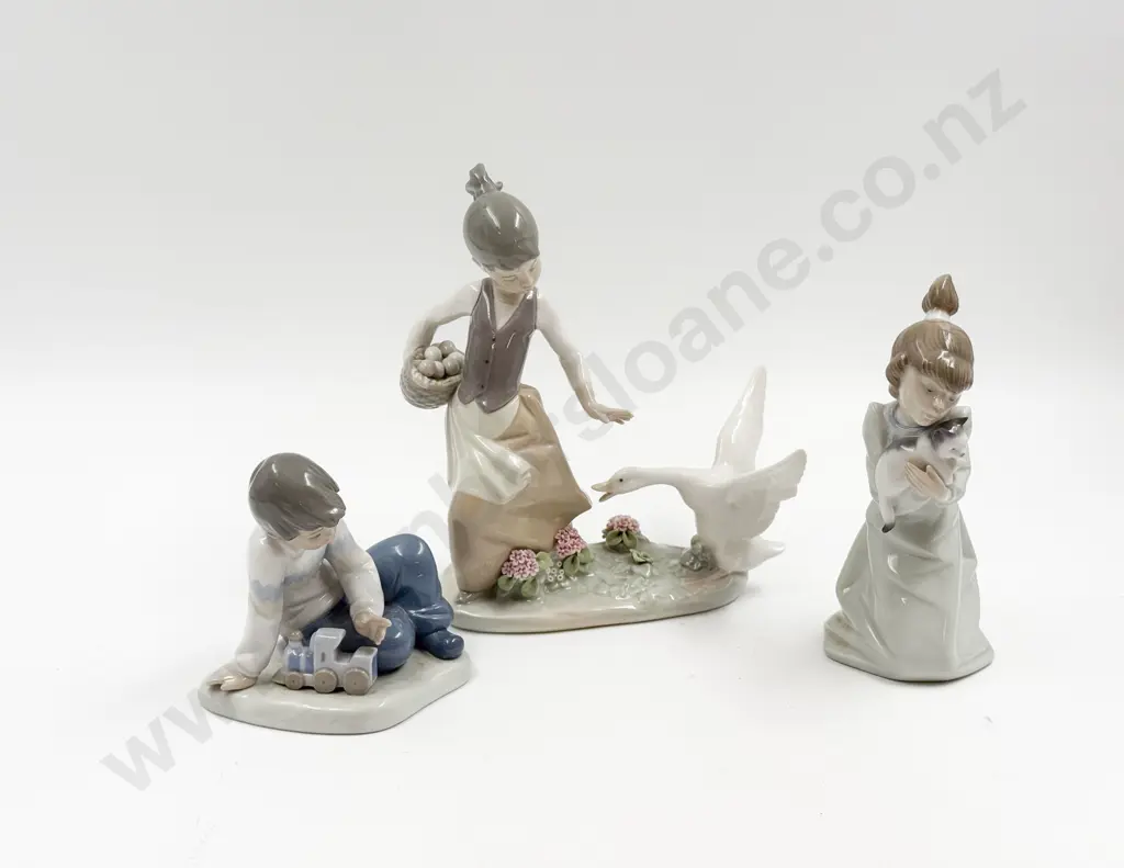 Two Lladro Figures together with Nao Figure Image 1++