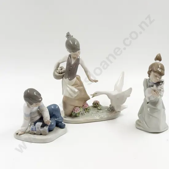 Two Lladro Figures together with Nao Figure