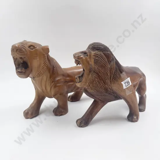 Two Carved Lions