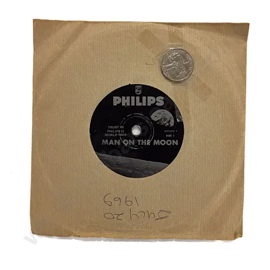 Man on the Moon - July 20th 1969 - Vintage Vinyl 45rpm Record together with Comm. Coin
