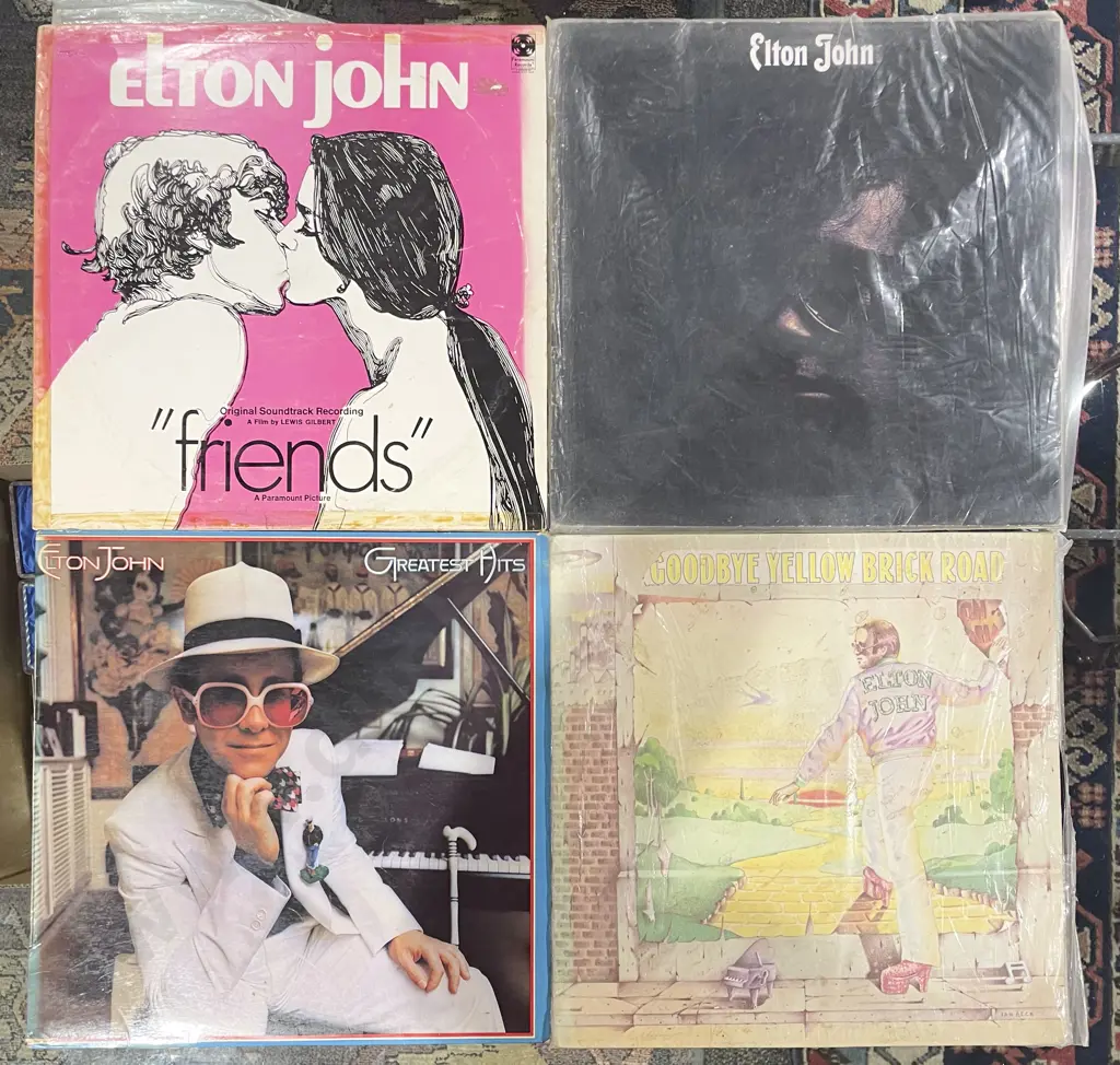 Four Assorted Elton John Vinyl Records Image 1++