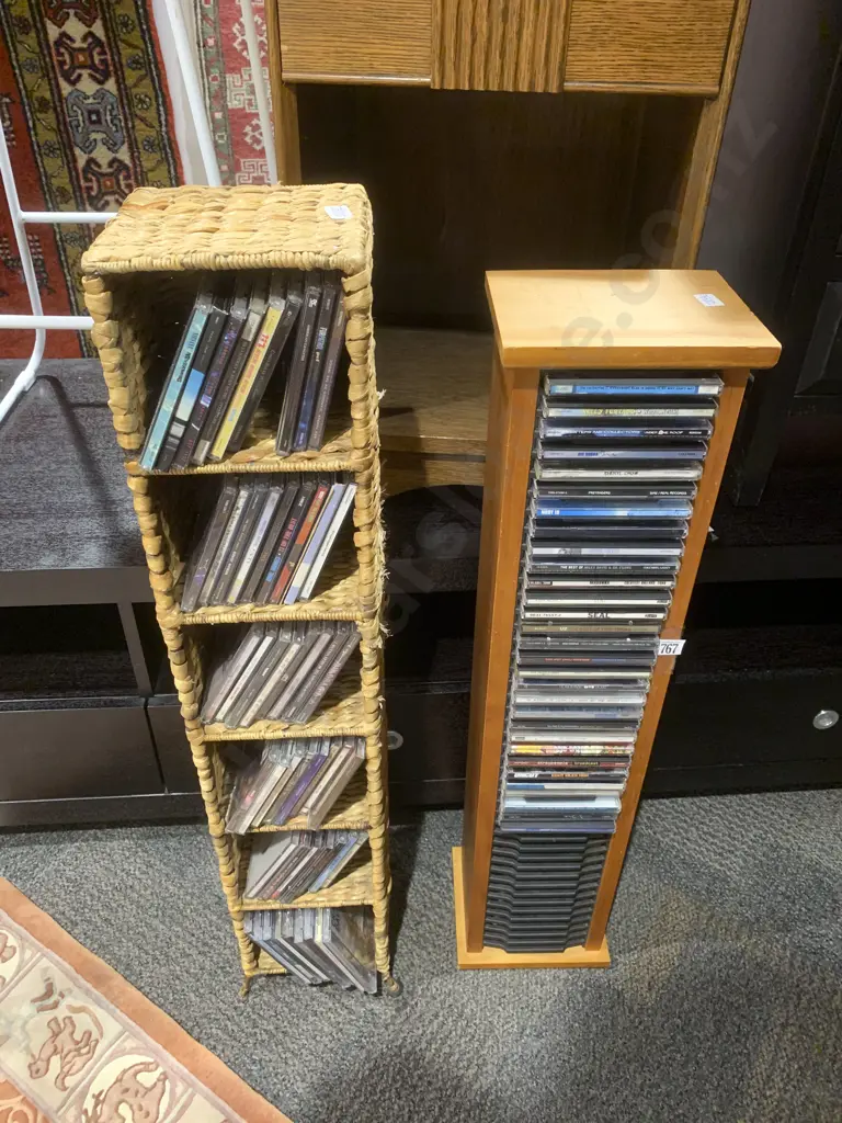 Two CD Racks with Assorted CDs Image 1++