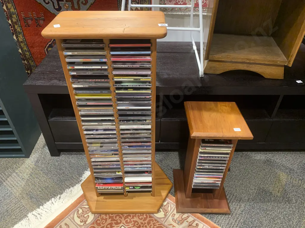 Two CD Racks with Assorted CDs Image 1++