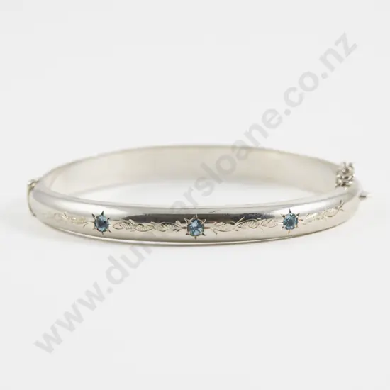S/S Three Stone Topaz Hinged Snap Bangle