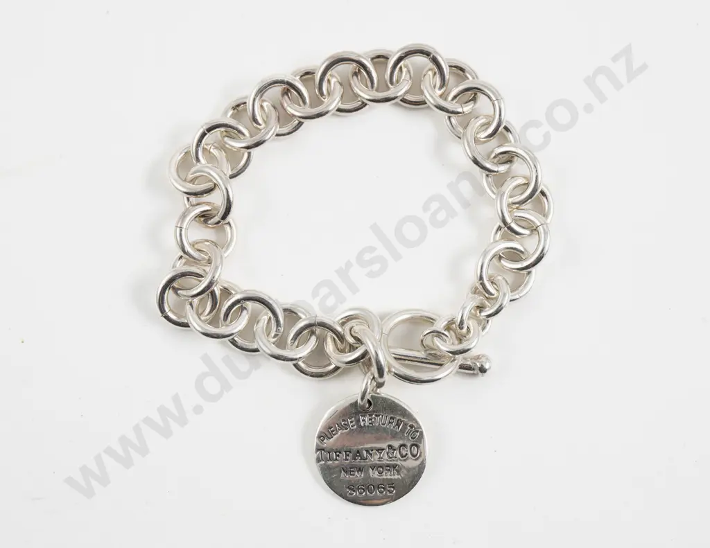 Faux Tiffany & Co Sterling Silver Circular Tag Charm Bracelet Image 1++