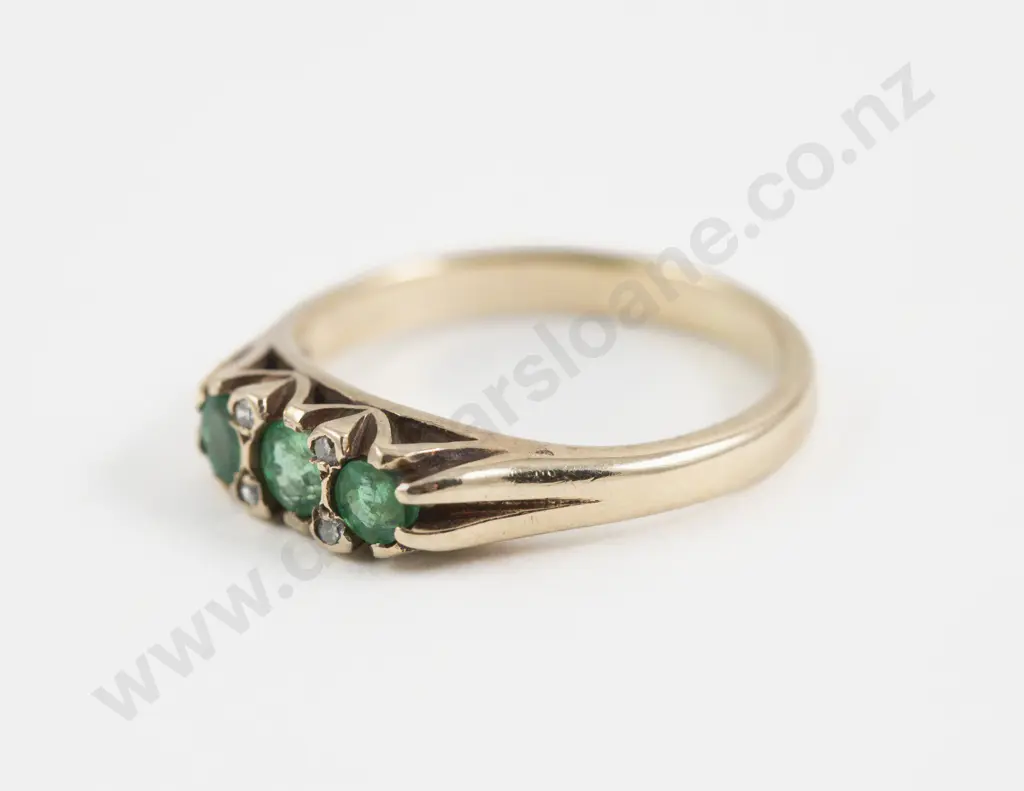 9ct Seven Stone Emerald and Diamond Bridge Ring Image 1++