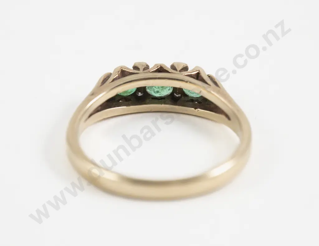 9ct Seven Stone Emerald and Diamond Bridge Ring Image 1++