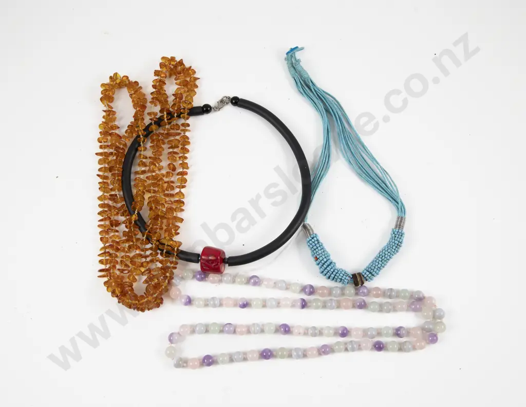 Single Strand Opera Length Amber Bead Necklace with Three Others Image 1++
