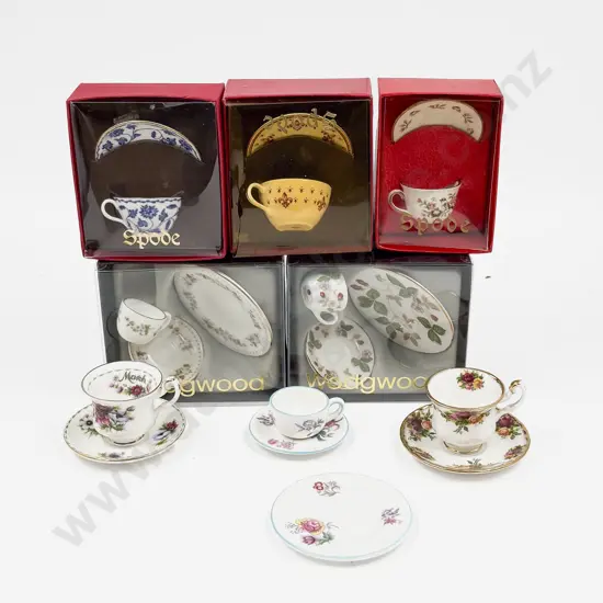 Eight Various Manufacture Miniature Cups and Saucers
