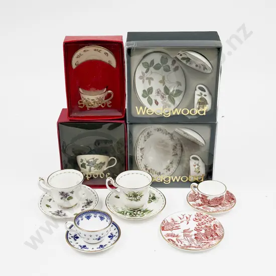 Eight Various Manufacture Miniature Cups and Saucers