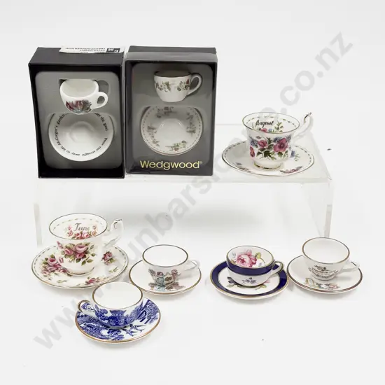 Eight Various Manufacture Miniature Cups and Saucers