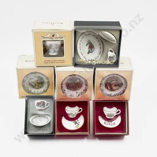 Eight Various Manufacture Miniature Cups and Saucers