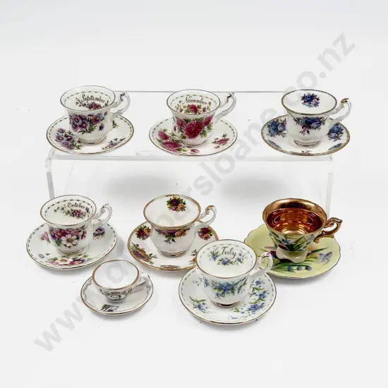 Eight Various Manufacture Miniature Cups and Saucers