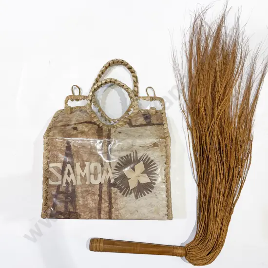 A Vintage Fly Whisk together with Woven Samoa Tourist Ware Bag