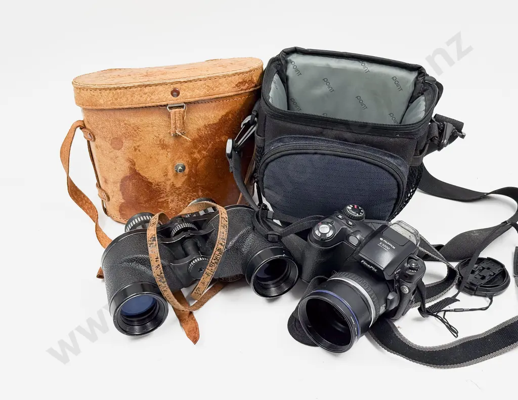 Digital Camera together with Binoculars in Case Image 1++