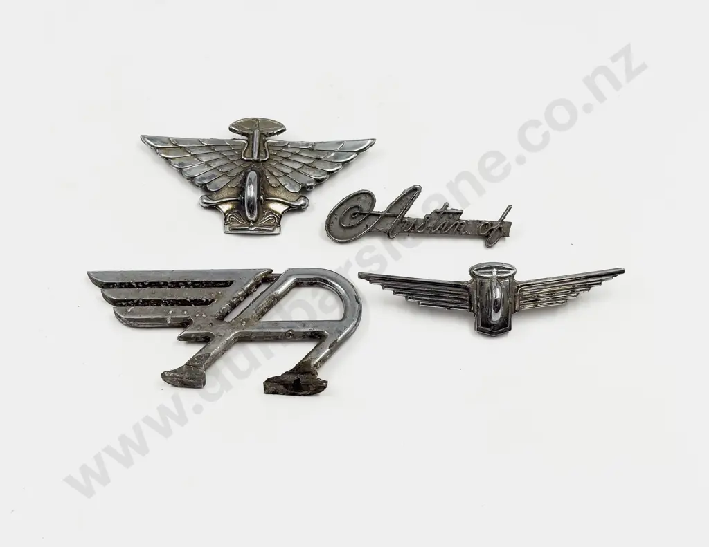 Vintage Austin Flying 'A' Mascot and Three Various Badges Image 1++