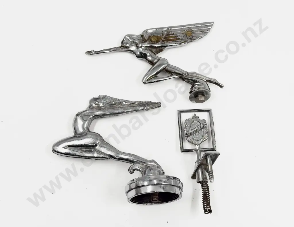 Vintage Oldsmobile Car Hood Badge with Two Art Deco Speed Nymph Car Mascots Image 1++