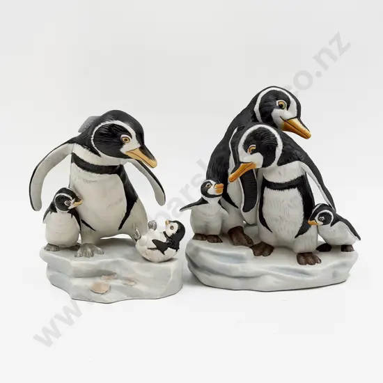 Two Franklin Mint Penguin Group Figures