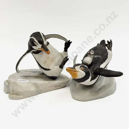 Two Assorted Penguin Ornaments
