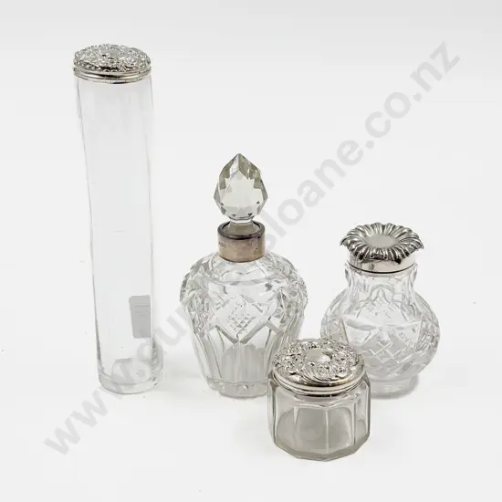 Three S/S Topped Vanity Jars together with S/S Collared Scent Bottle
