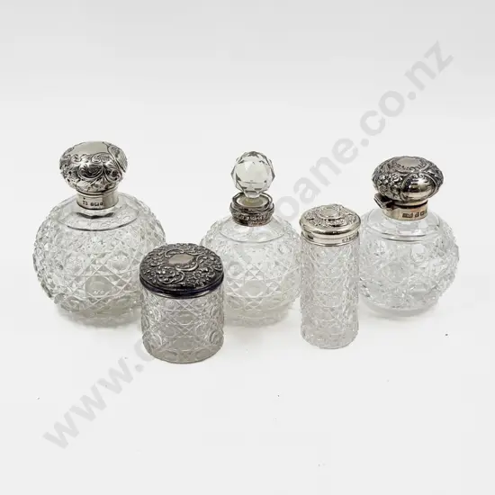 A Set of Five S/S Topped/Collared Vanity Bottles/Jars