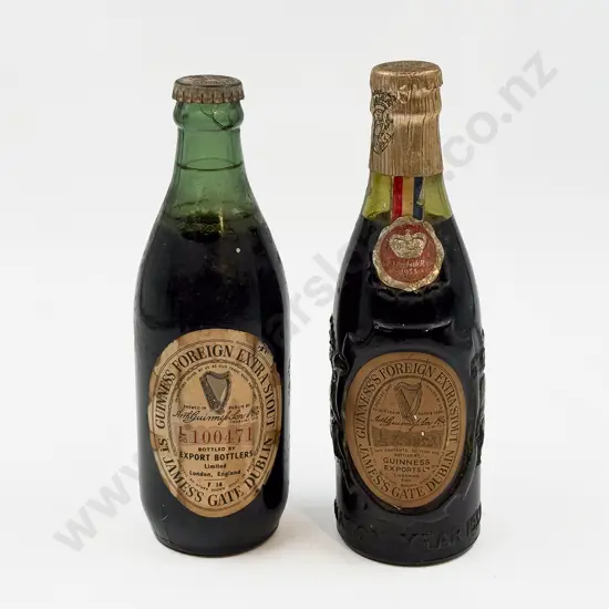 A Vintage Guinness Coronation Bottle 1953 with Other Vintage Guinness Bottle