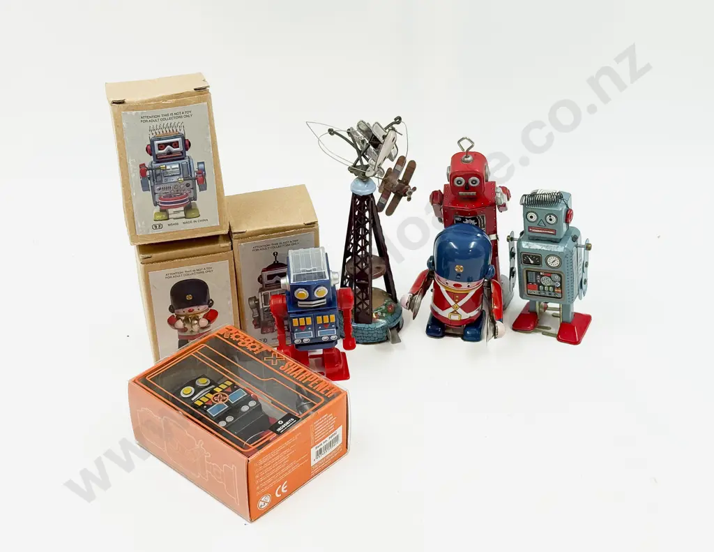 Boxed & Unboxed Eight Small Robot & Soldier Clockwork Toys With Airplane Tower Image 1++