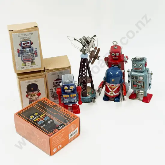 Boxed & Unboxed Eight Small Robot & Soldier Clockwork Toys With Airplane Tower