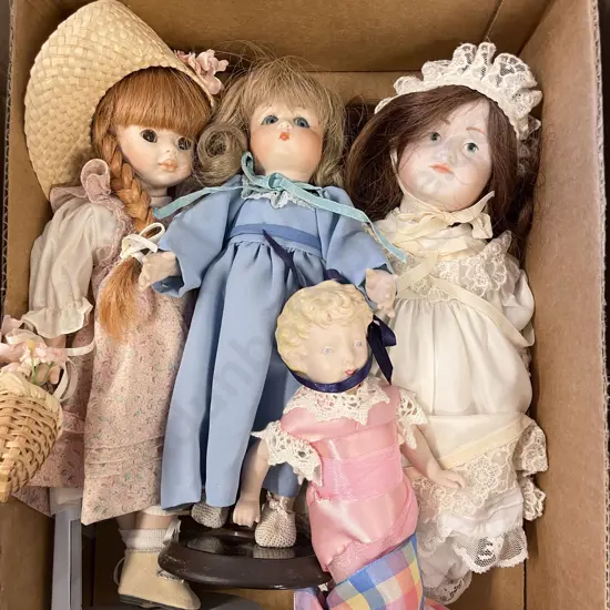 Four Small New Bisque Dolls