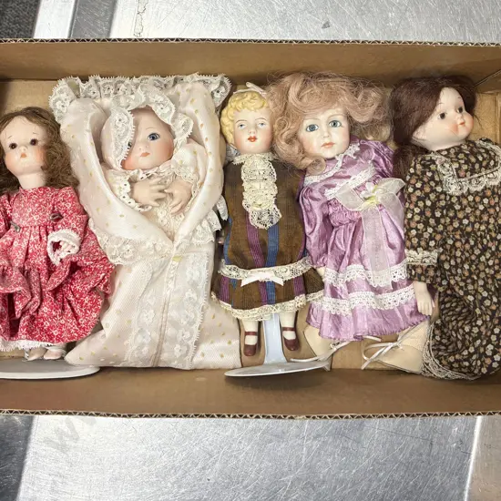 Five Small New Bisque Dolls