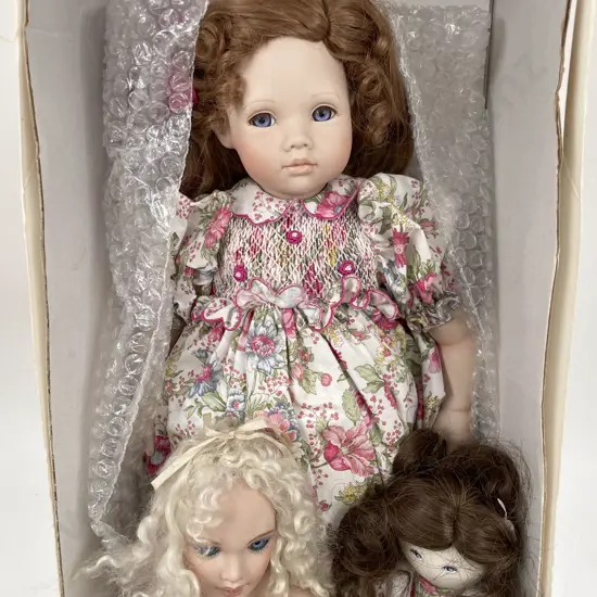 New Bisque Doll and Two Doll Busts