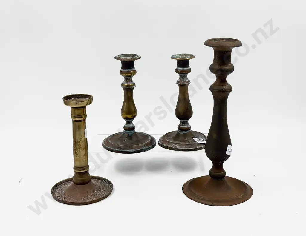 Four Assorted Copper and Brass Candle Sticks Image 1++