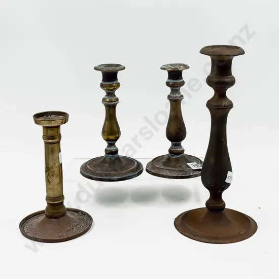 Four Assorted Copper and Brass Candle Sticks