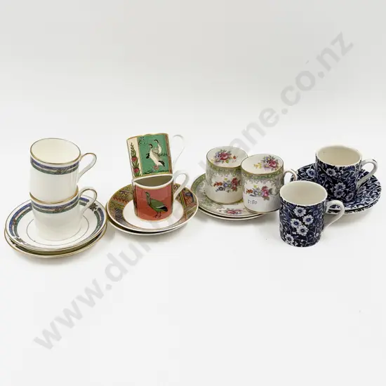 Eight Assorted Demi-Tasse Cups and Saucers